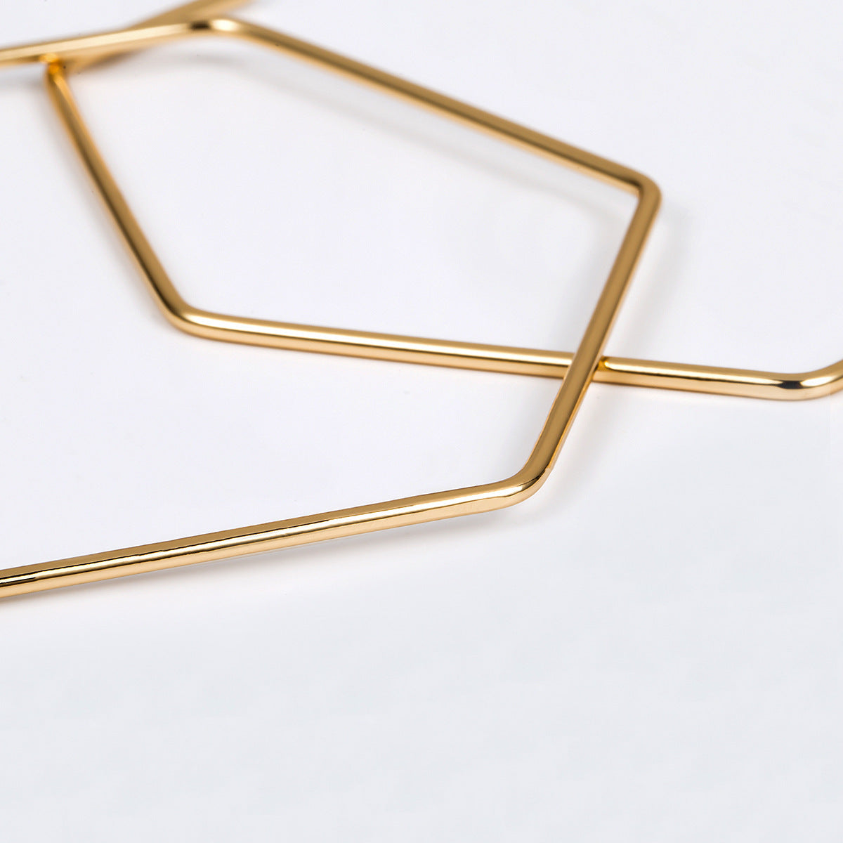 Exaggerated Silhouette Metal Earrings with Hexagonal Openings