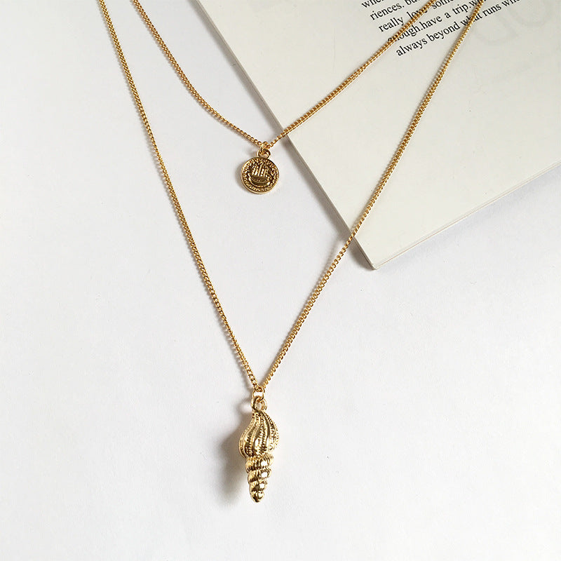 Gold Coin Conch Necklace with Minimalist Design and European Influence