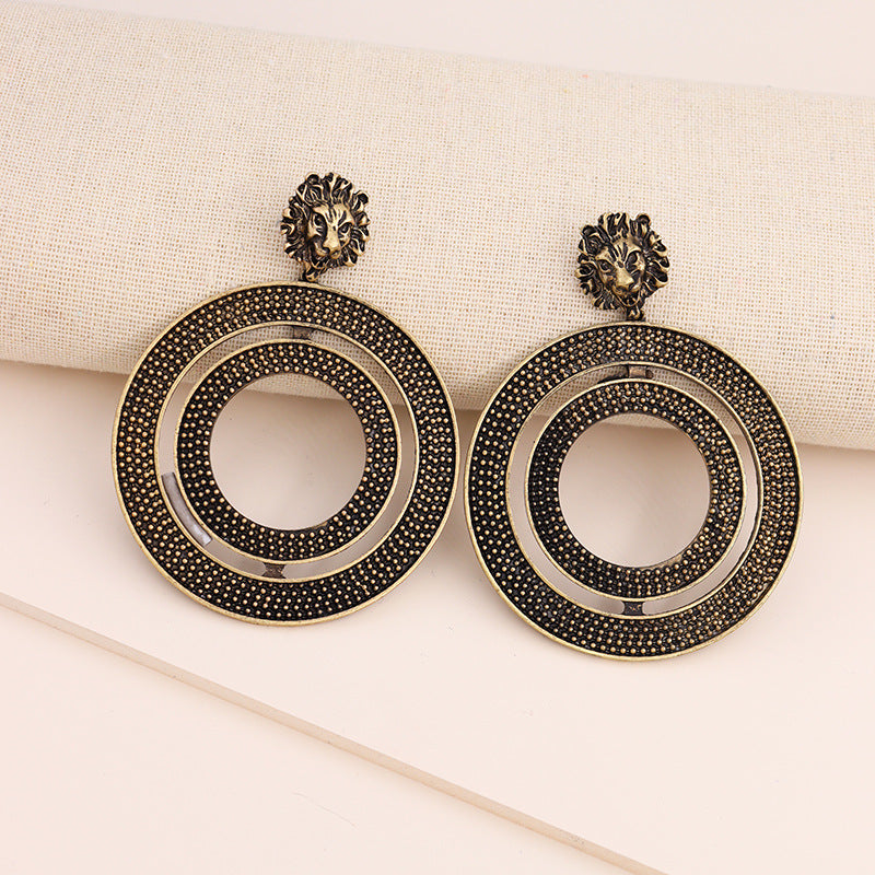 Regal Lion Head Earrings with Metal Texture - Vienna Verve Collection