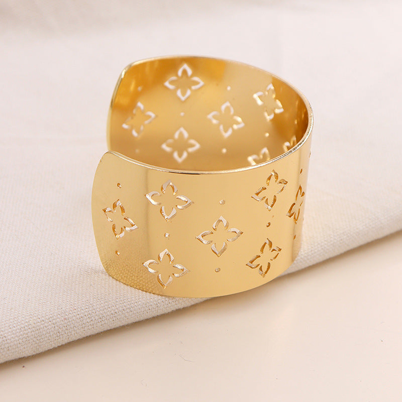 Exaggerated Wide Face Metal Texture Bracelet with Geometric Hollow Star Flower Design