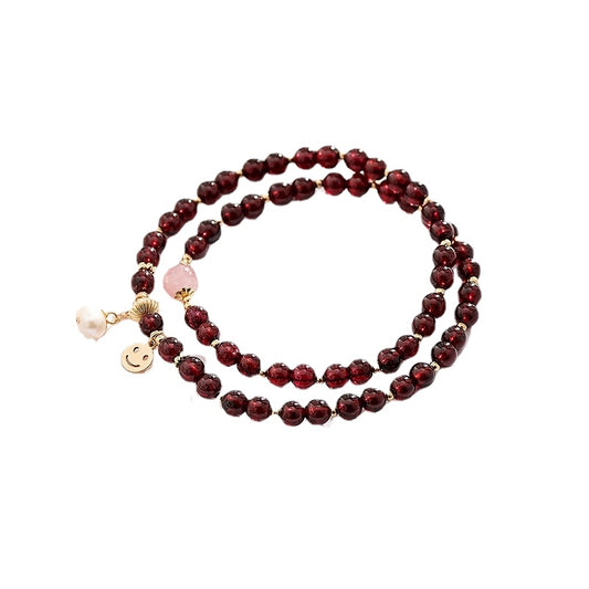 Smiling Face Pink Crystal and Pearl Bracelet with Garnet Double Ring Detail