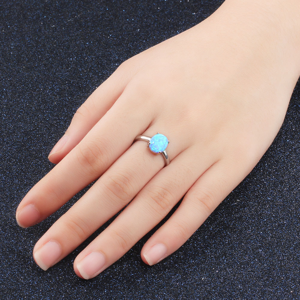 Solitaire Oval Blue Opal Polished Sterling Silver Ring