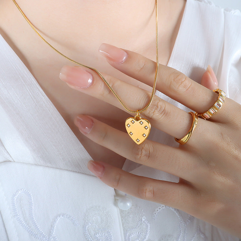 Luxury Heart-Shaped Zircon Pendant Necklace in Titanium Steel with Gold-Plated Snake Bone Chain