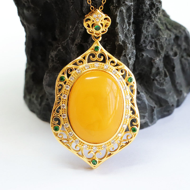 Sterling Silver Necklace with Amber Pendant and Green Zircon Detail