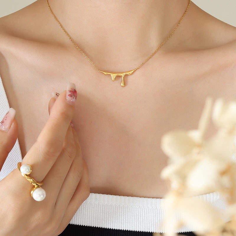 Luxurious 18K Gold Plated Water Drop Pendant Necklace with Lava Light Design
