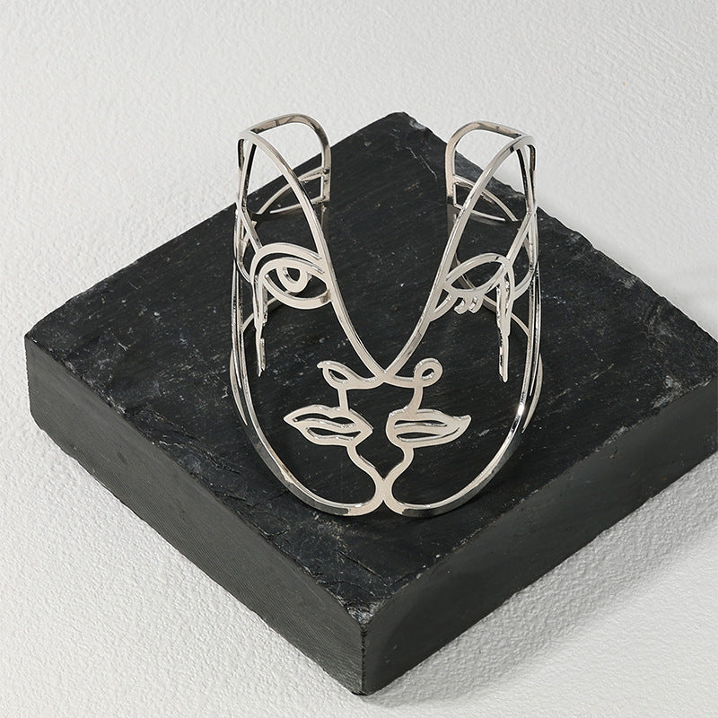 Exaggerated Metal Hollow Face Bracelet - Vienna Verve Collection