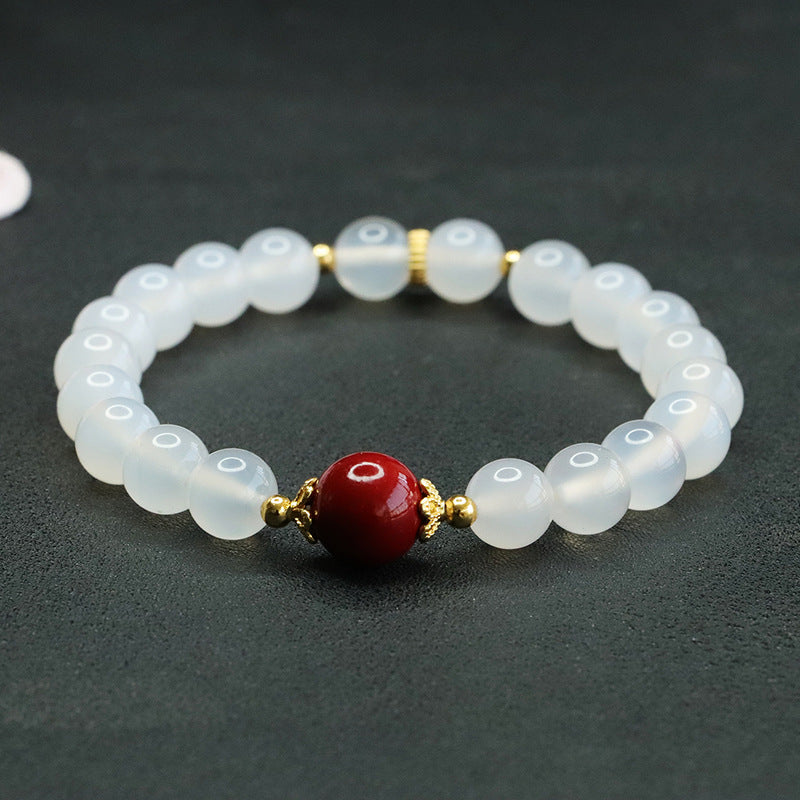 Fortune's Favor Sterling Silver Bracelet with Cinnabar Bead and Natural White Chalcedony