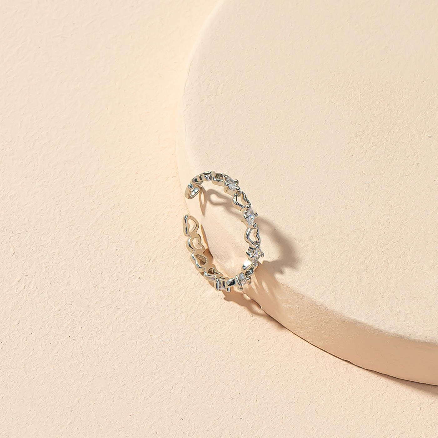 Heartfelt Elegance: Contemporary Heart Opening Ring with a Twist