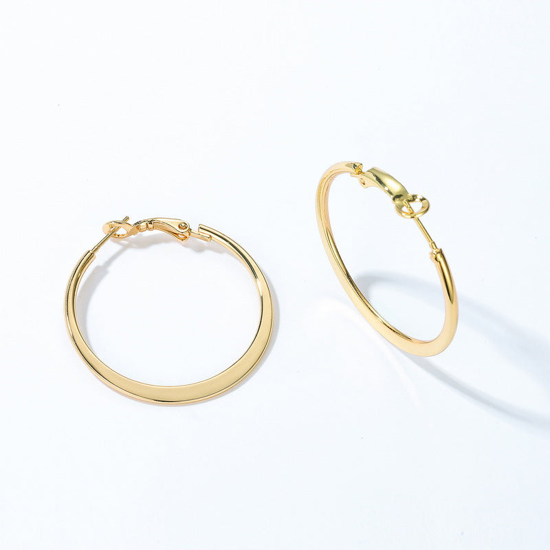 Gold-Tone Curved Metal Hoop Earrings