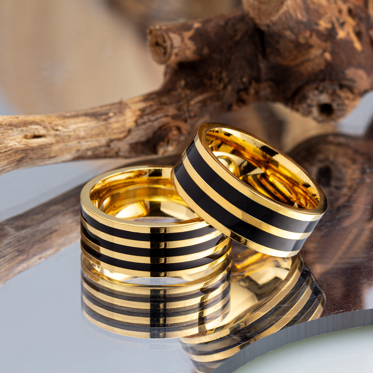 Elegant Titanium and Steel Lover's Ring with Gold-Plated Finish