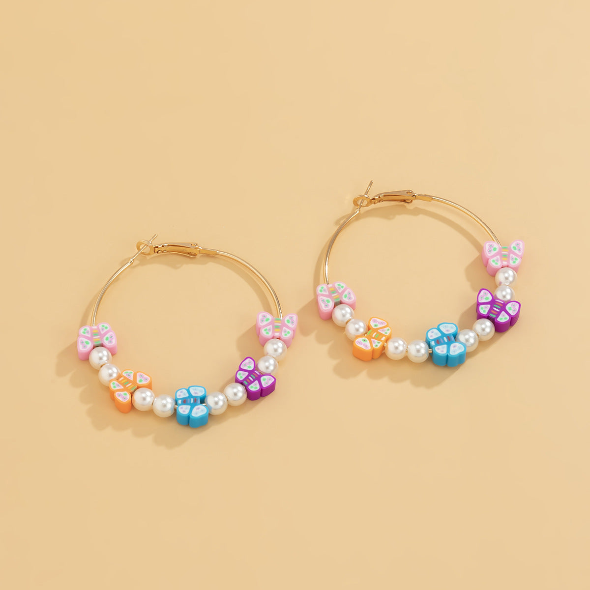 Holiday Style Butterfly Earrings with Imitation Pearls and Soft Clay Flowers