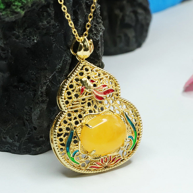 Lotus Leaf Fish Gourd Pendant Necklace crafted in Beeswax Amber and Sterling Silver