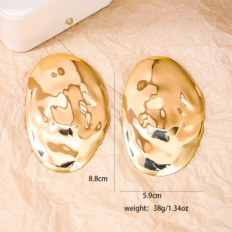 Statement Earrings with an Edgy Metal Design and Irregular Oval Shape