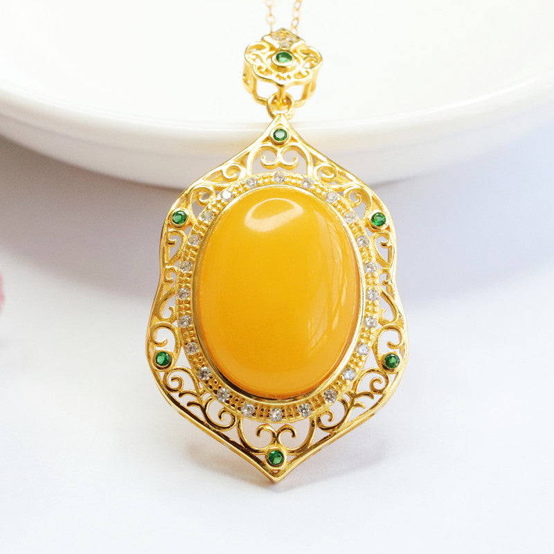 Sterling Silver Necklace with Amber Pendant and Green Zircon Detail