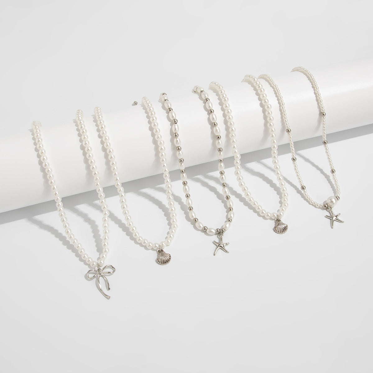 Pearl-Style Starfish & Bow Layered Necklace