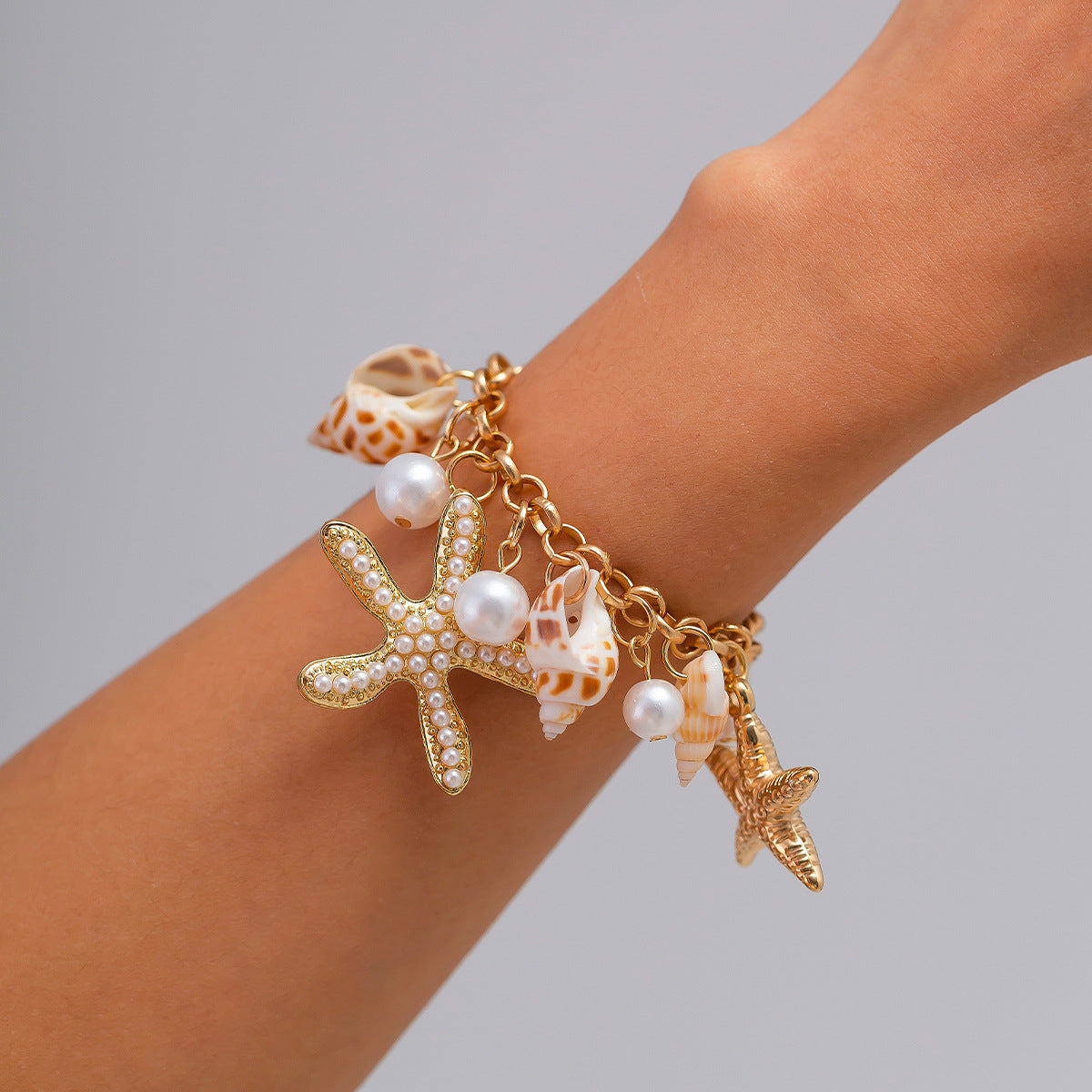 Planderful Vienna Verve Ring – Adjustable Beach-Inspired Design with Starfish and Pearl Accents