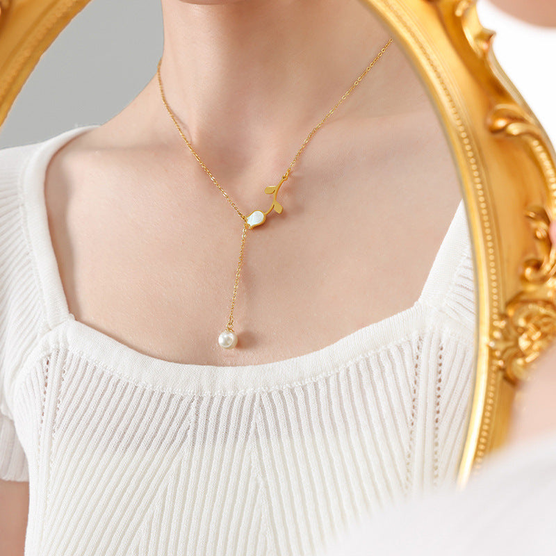 Elegant Seashell Rose Necklace with Baroque Pearl Pendant