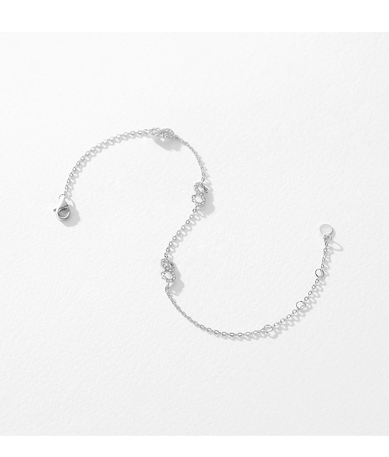 Infinite Love Sterling Silver Bracelet with Zircon Gems by Planderful