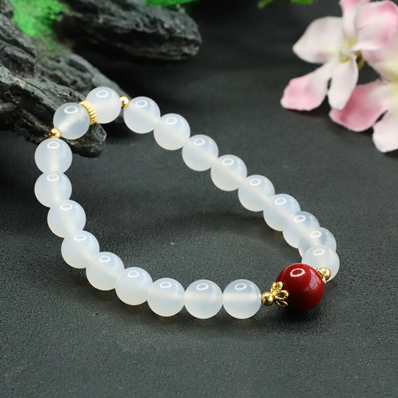 Fortune's Favor Sterling Silver Bracelet with Cinnabar Bead and Natural White Chalcedony