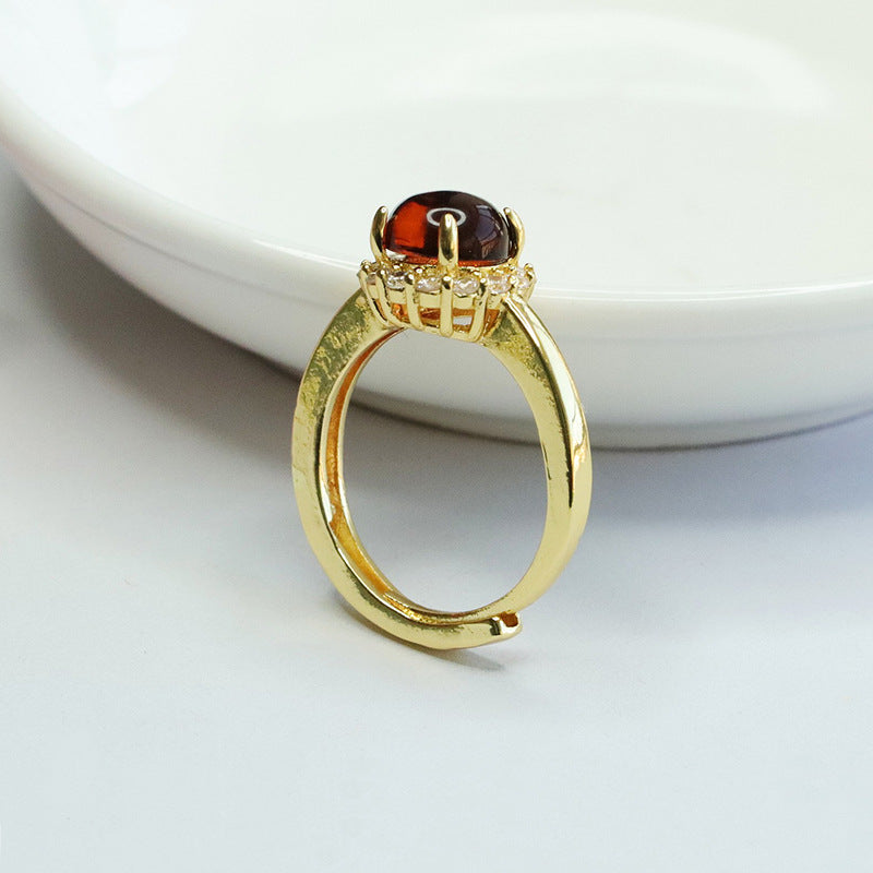 Amber Blood Zircon Ring with Halo Detail