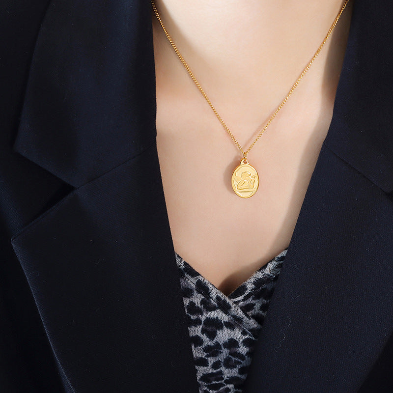 Golden Angel Oval Pendant Necklace with Niche Design by Planderful