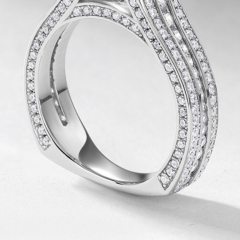 Planderful Four-Prong Moissanite Sterling Silver Ring