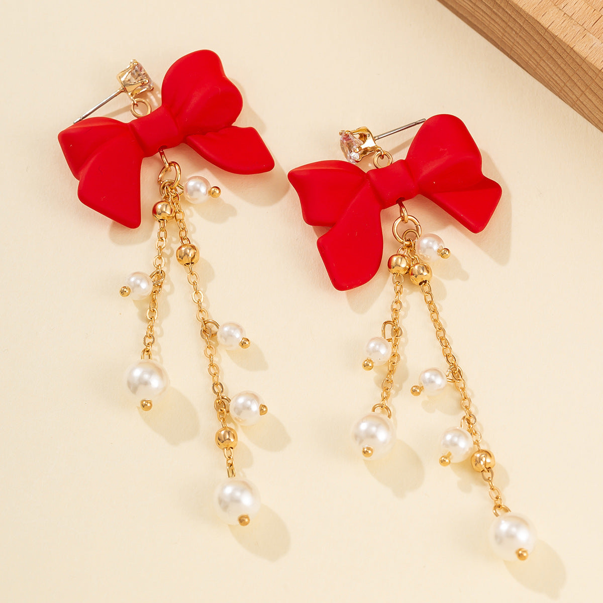 European and American Cross Border Instagram Sweet Red Bow Earrings with Elegant Imitation Pearl Tassels