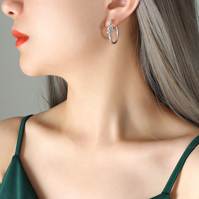 Golden Knotted Circle Stud Earrings by Planderful Collection