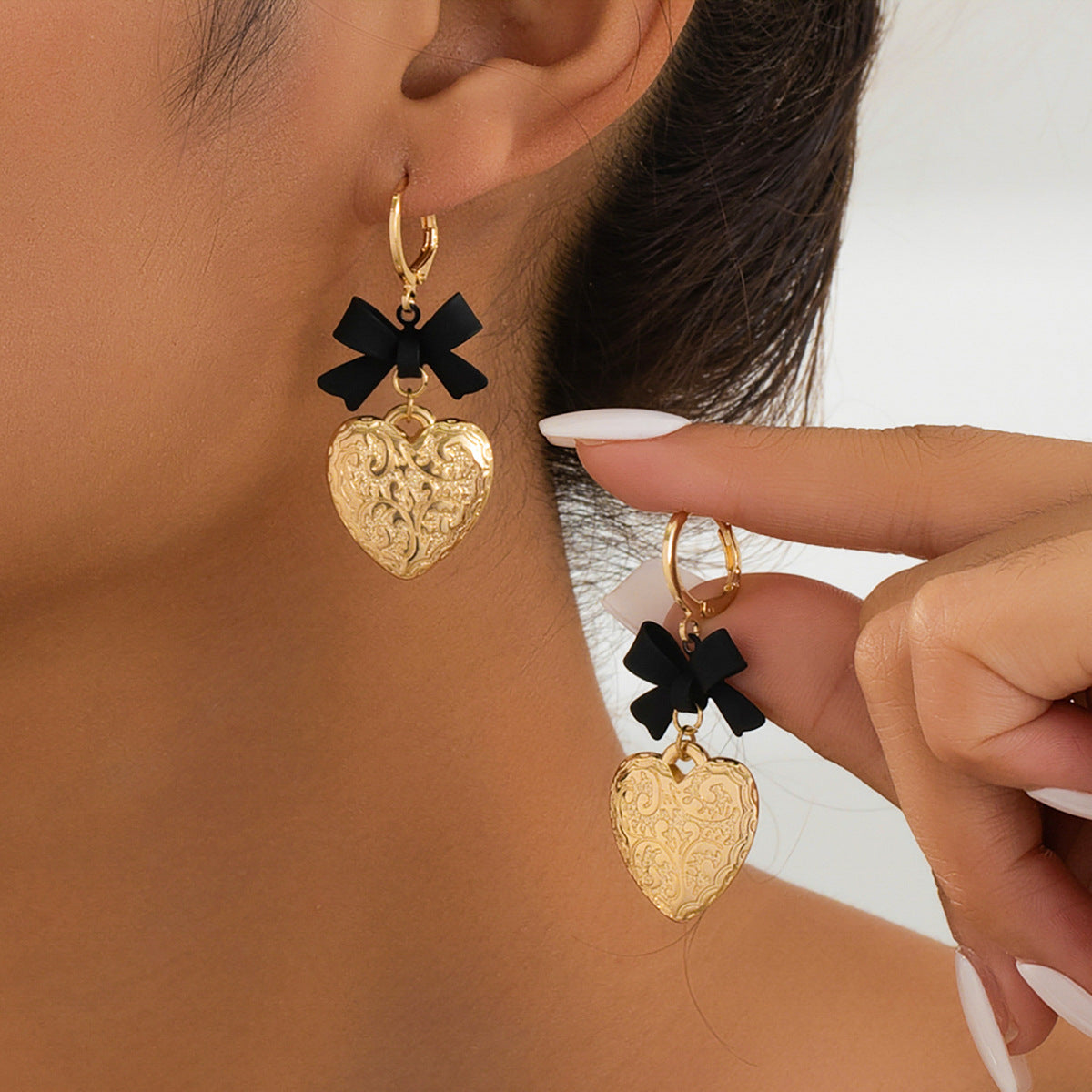 Planderful Vienna Verve Earrings – Elegant Metal Love Bow Design