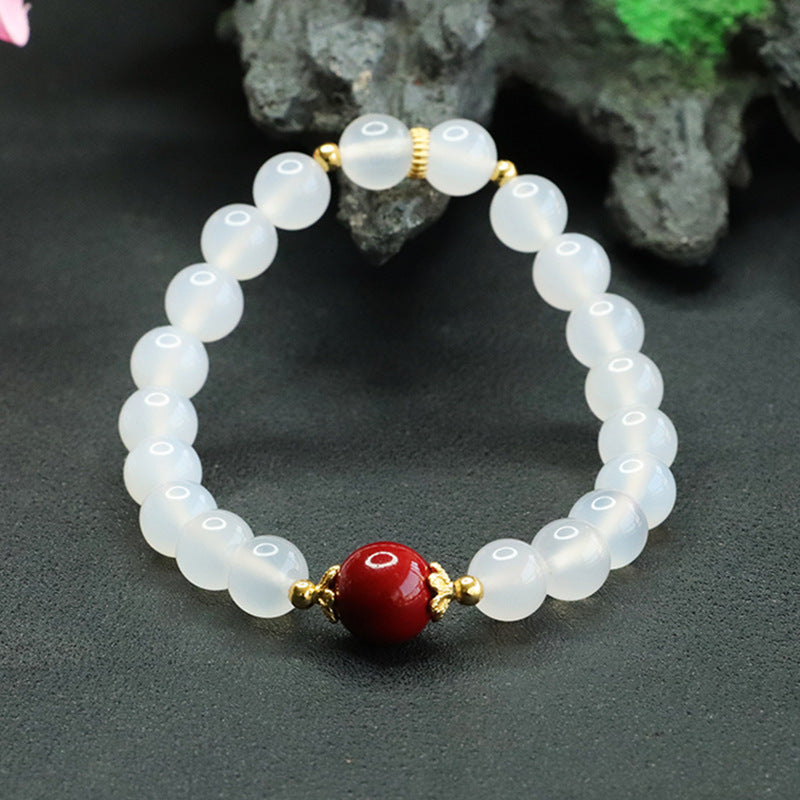 Fortune's Favor Sterling Silver Bracelet with Cinnabar Bead and Natural White Chalcedony