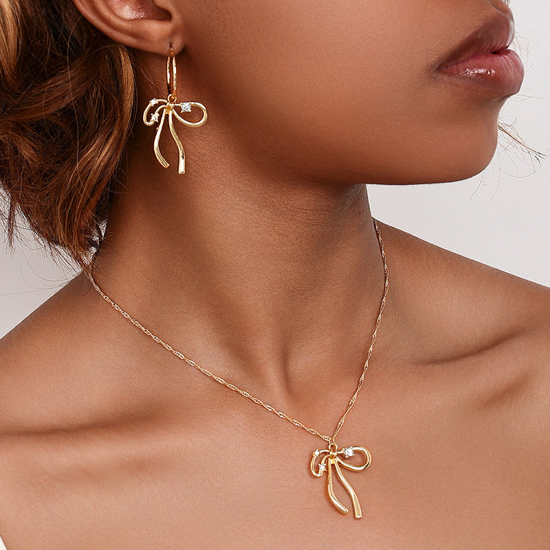 Elegant Bow Necklace and Earrings Set with European Charm and Metal Irregularity