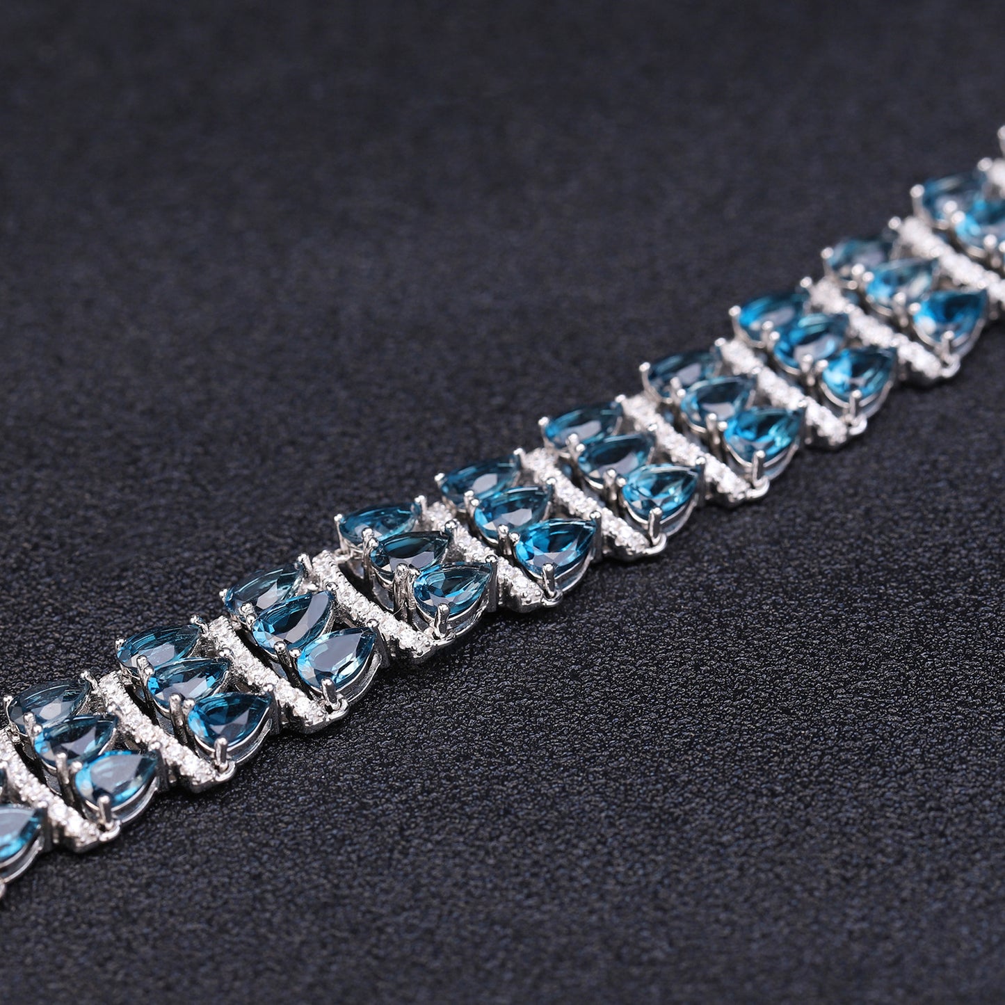 Three Row of Pear Shape Natural Blue Topaz Silver Bracelet
