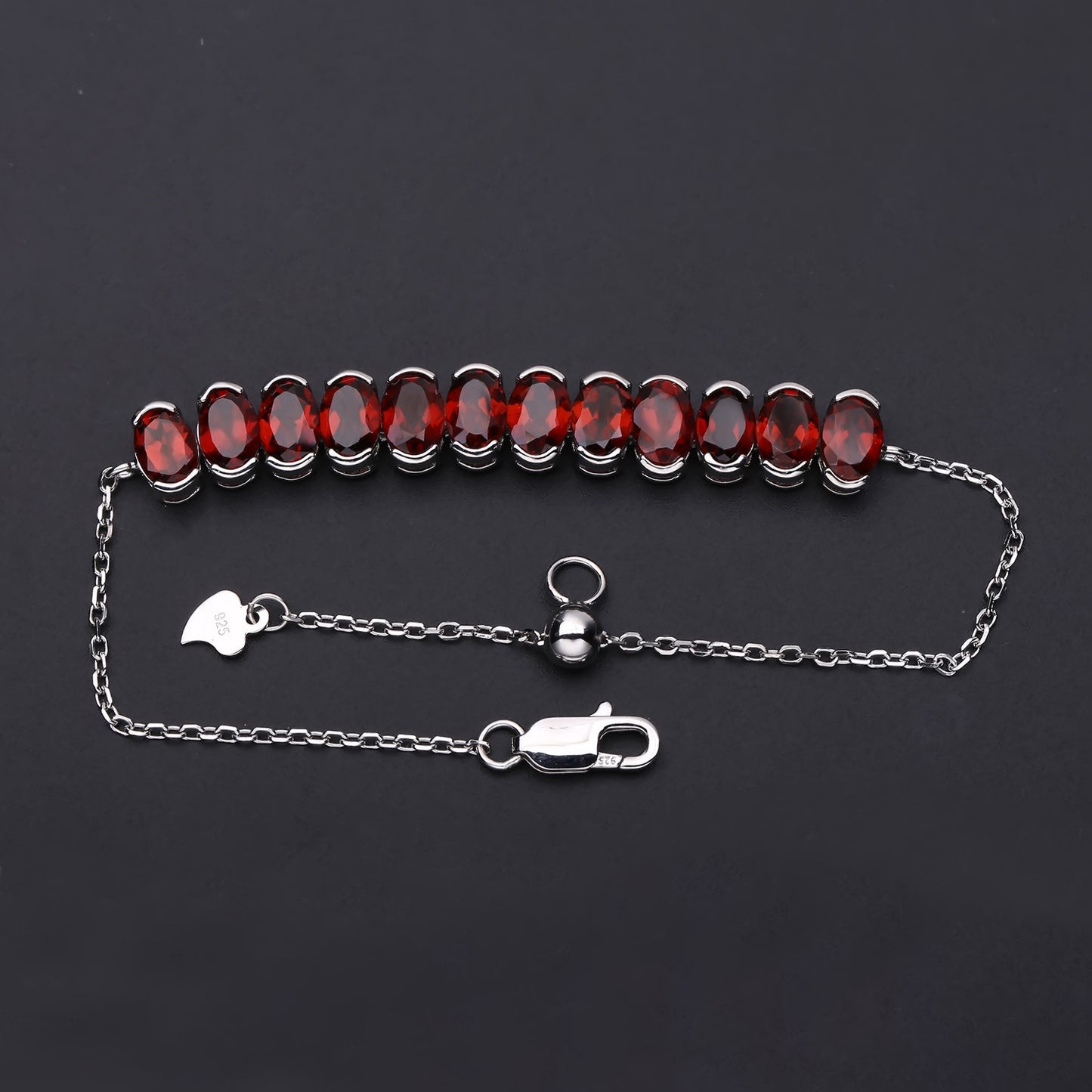 A Row of 12 Oval Shape Gemstones Silver Bracelet