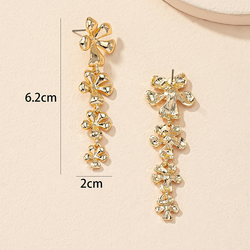 Vienna Verve Metal Stud Earrings with Five-Leaf Flower Design