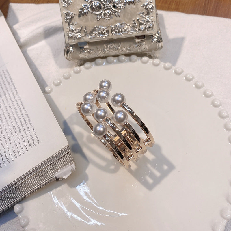 Fragrant Essence Gold Metal Bracelet with Delicate Openwork Design