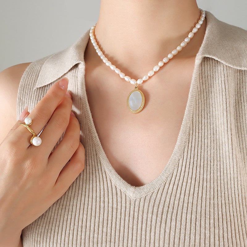 Elegant French Pearl Necklace with Sea Shell Pendant