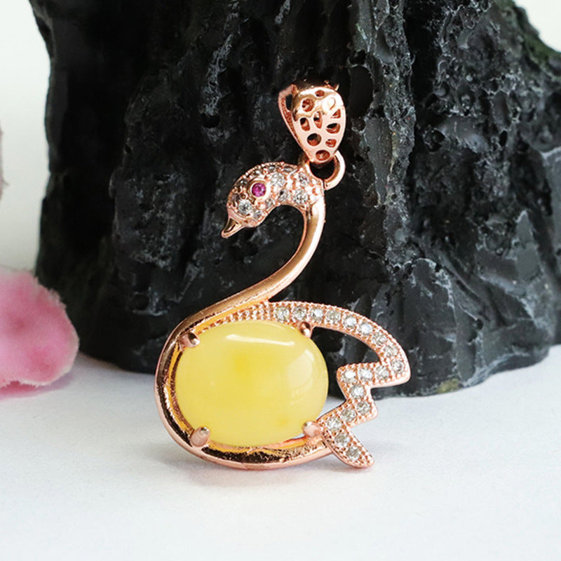 Swan Pendant Crafted from Sterling Silver with Beeswax Amber Gem
