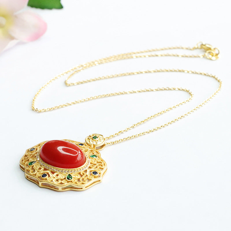 Egg-Shaped Sterling Silver Necklace with South Red Agate Pendant and Zircon Hollow Detail