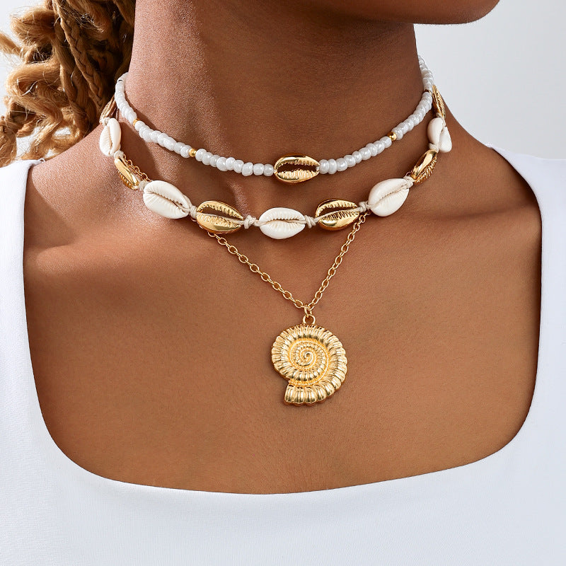 Planderful Vienna Verve Necklace – Beachy Chic Metal Conch Shell Design