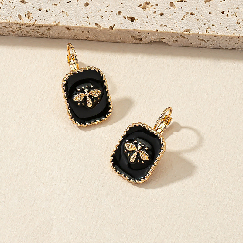 Luxurious Black and Gold Bee Drop Earrings - Vienna Verve Collection