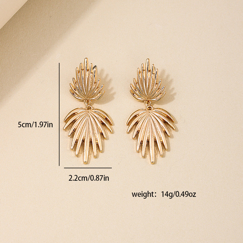 Exaggerated Fan-Shaped Tassel Earrings with Retro Maple Leaf Design