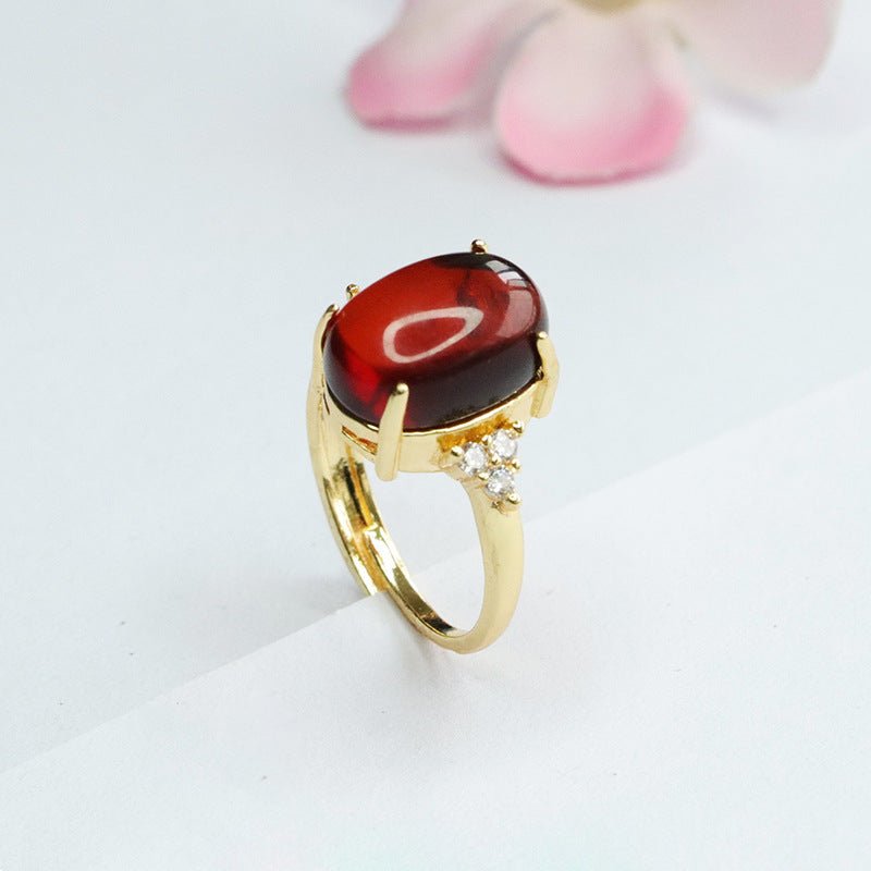 Blood Amber Oval Ring with Three Small Zircon Stones - Sterling Silver Jewelry