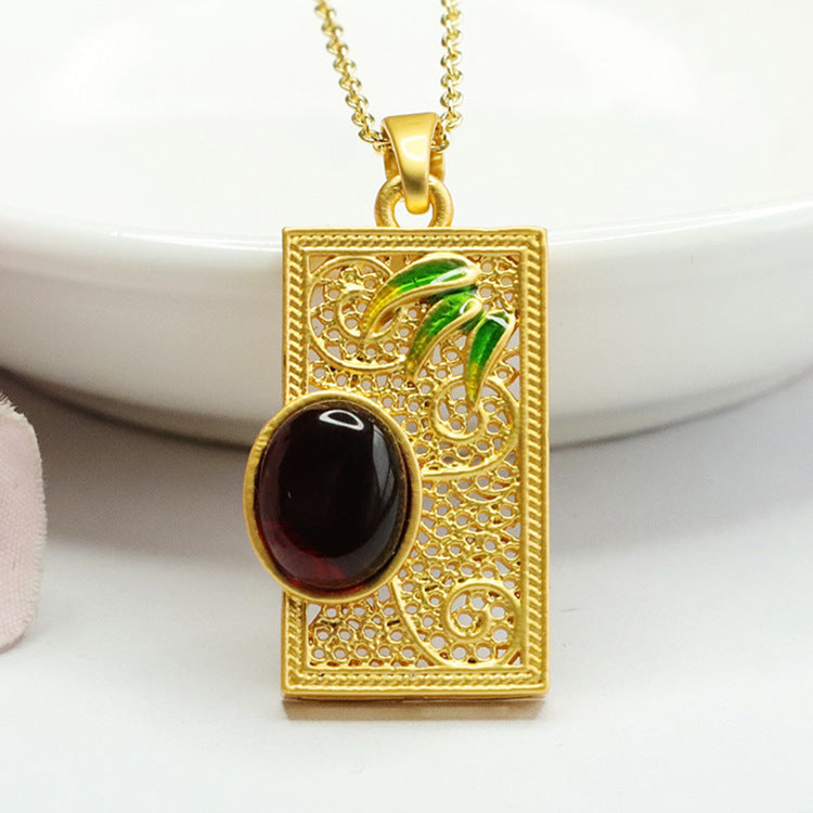 Chinese Jewelry Collection: Sterling Silver Bamboo Leaf Pendant Necklace with Beeswax Amber Gem