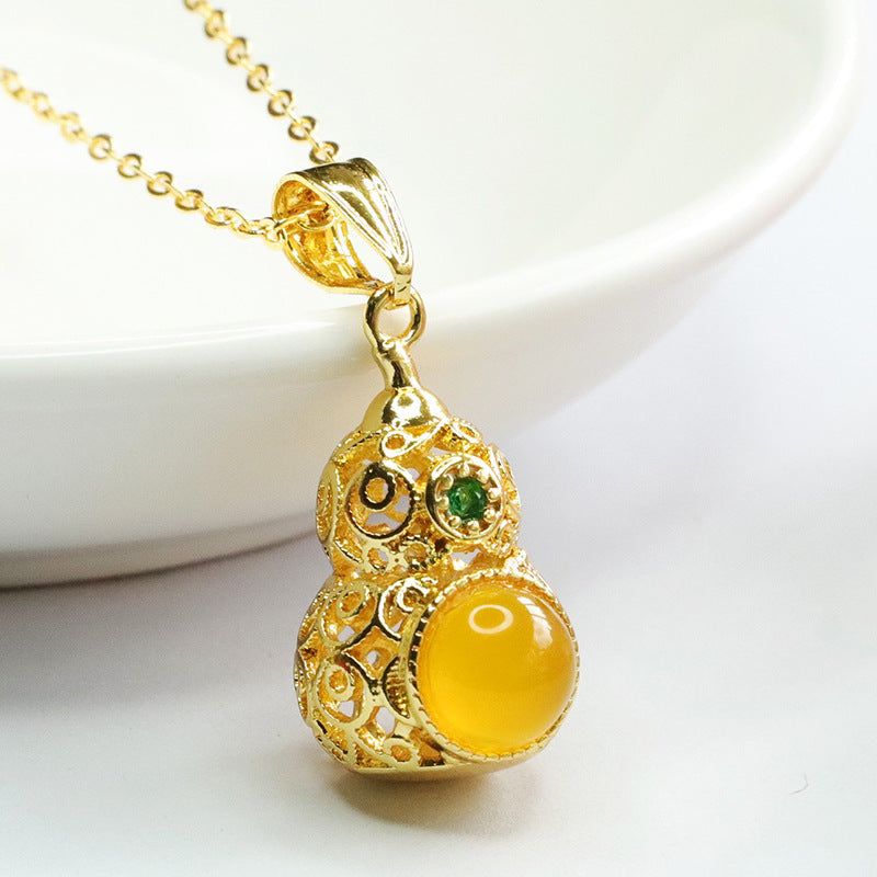 Hollow Gourd Pendant with Yellow Chalcedony