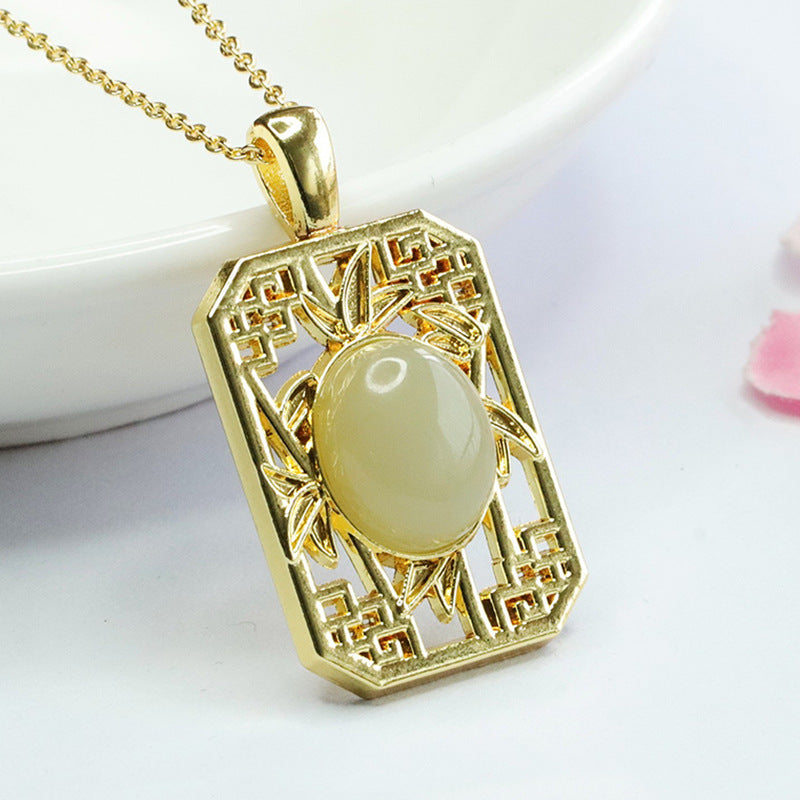 Bamboo Hollow Sterling Silver Pendant with Hotan Jade