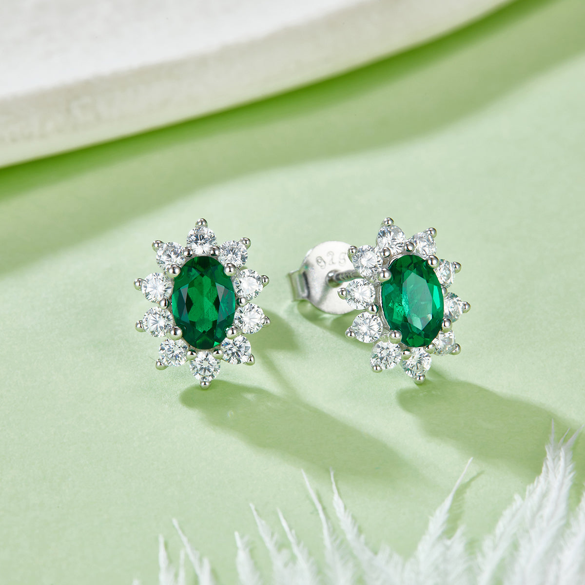 0.8 Carat Oval Lab-Created Emerald Halo Stud Earrings in S925 Silver Plated Platinum