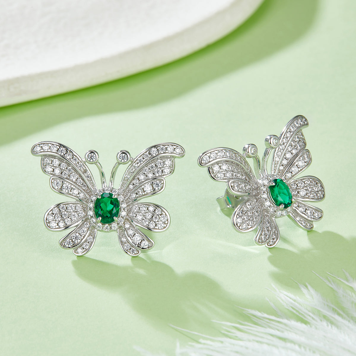 0.39 Carat Oval Lab Created Emerald Butterfly Stud Earrings in S925 Silver Plated Platinum