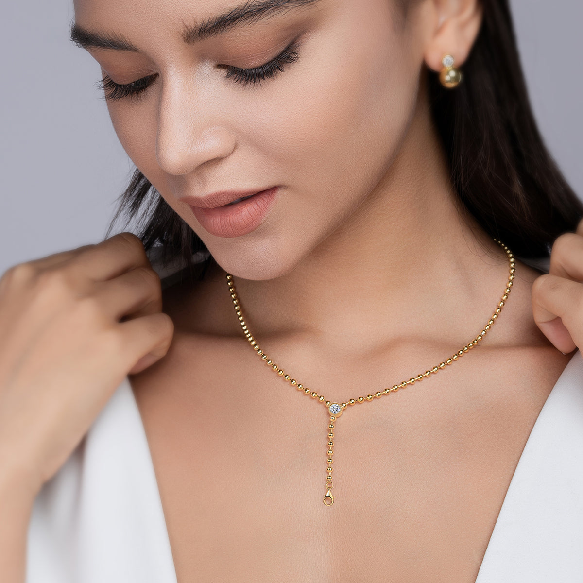 Silver Plated 18K Gold Round Bead Necklace with 0.5 Carat Moissanite