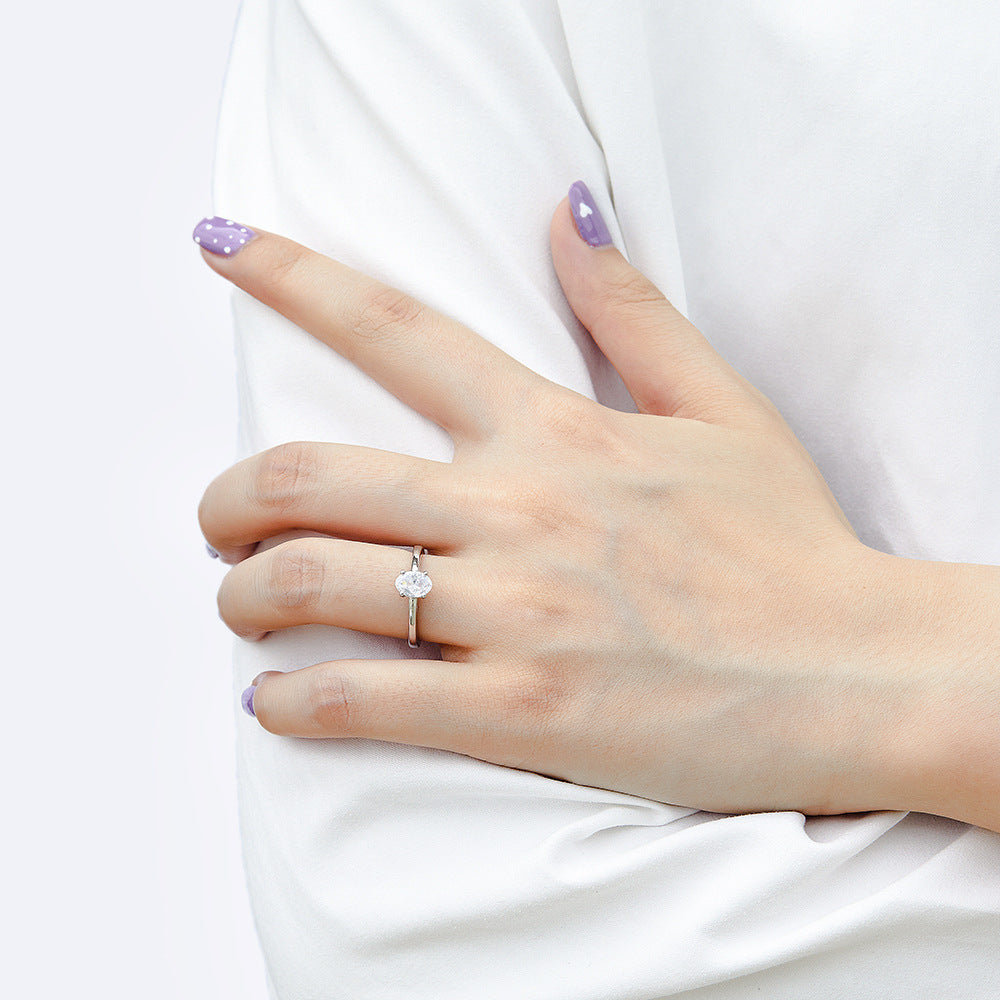 Four Prongs Oval Zircon Solitaire Silver Ring for Women