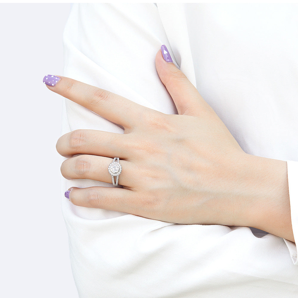 Round Zircon Soleste Halo Modern Split Shank Silver Ring